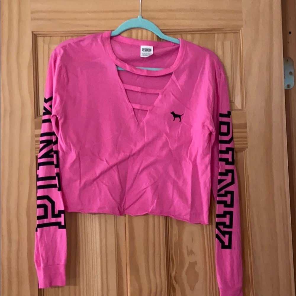 Pink crop top with cuts in the front